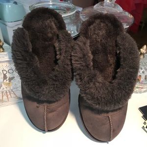 Brown Ugg slippers.